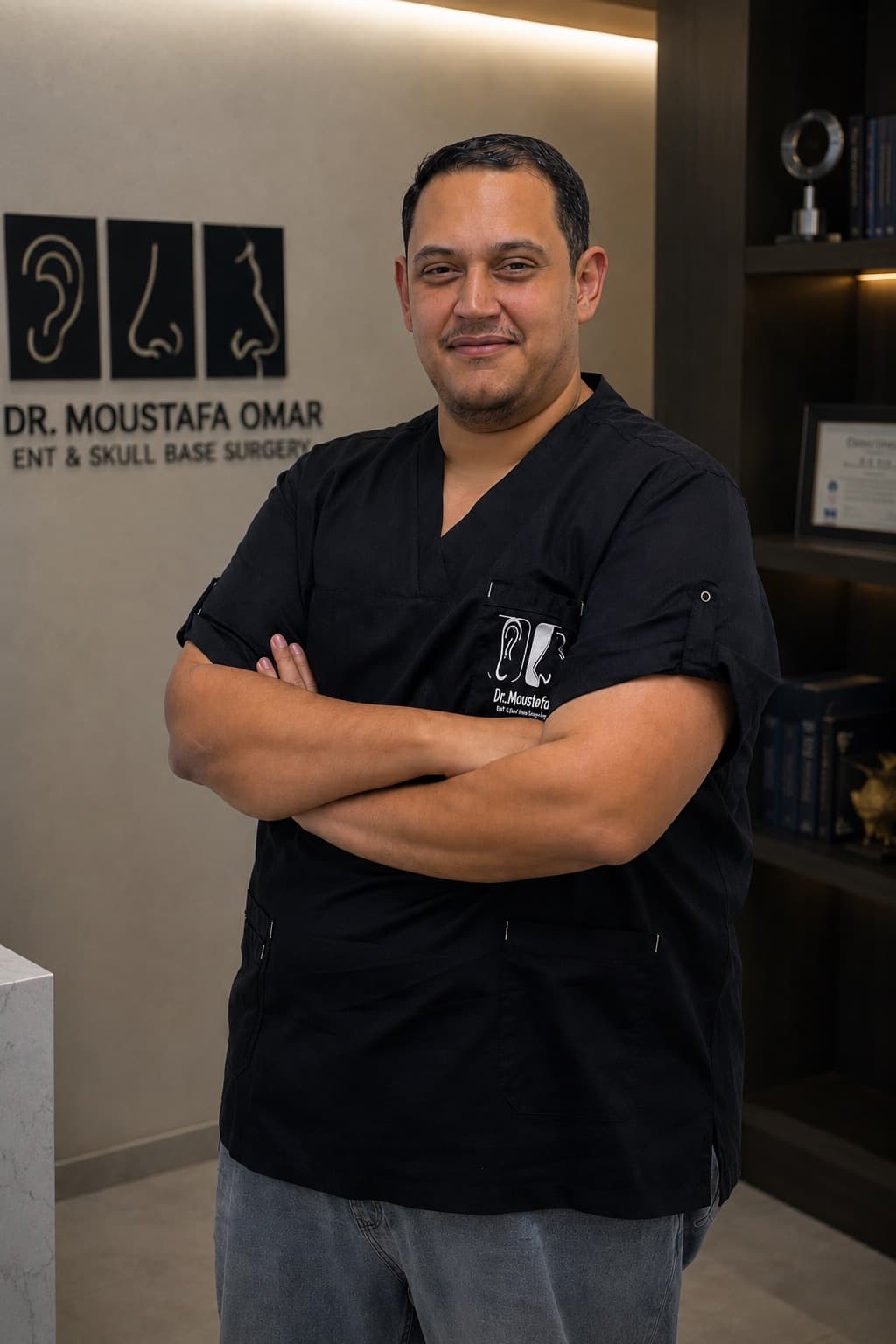 د. مصطفى عمر داخل العيادة — Dr. Moustafa Omar at the clinic